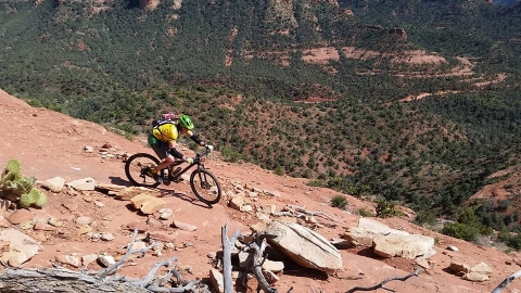 Finishing out the ride on Hangover with Bear Wallow Canyon below.