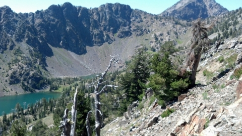 Top of the Twin Lakes Trail, with the lakes seen lower left and the semblance of a trail clinging to the ridge on the right.