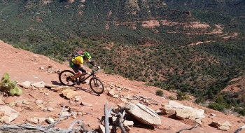 Finishing out the ride on Hangover with Bear Wallow Canyon below.
