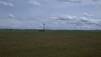 To find the trailhead, turn left road where you see this old windmill