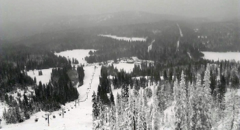 Looking down the chair lift on a foggy day