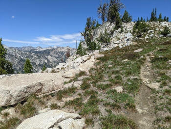 Trail coming down through the grassy islands, with Matterhorn seen on the left. 