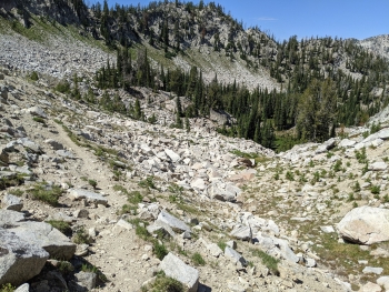 Pop Lake trail working through rocks. 