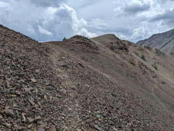 The initial drop down the east side of Polaris Pass.