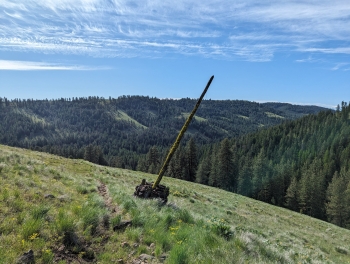 Old communication line pole just off the trail. 