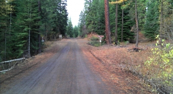 The intersection to look for from FS77. The sign for McBride Campground on the left and Summit Point on the right. 