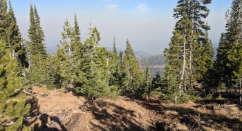 If it were not for the smoke, this would be a great view of the Seven Devils