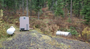 The trail starts right across the creek from this pump station.