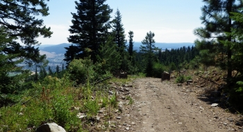 Looking back on ATV1, with La Grande seen through the trees on the lefts side.