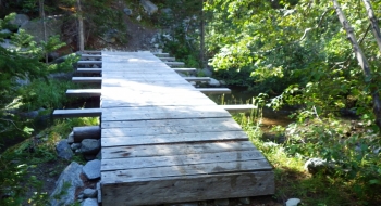 An impressive bridge just below the lake.