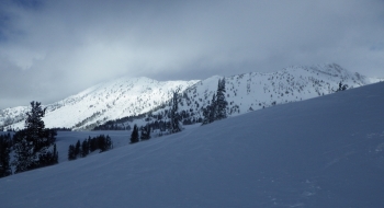 Cornucopia Peak is the point on the far right. The track here follows the middle ridge in the picture that climbs from left upward to the middle of the picture (the darker ridge not in the sun)
