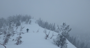 Hiking up a north ridge during a storm.