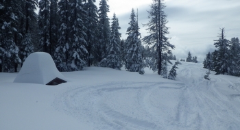 Rough Fork Trail near Mottet can catch a lot of snow. See the buried toilet. 