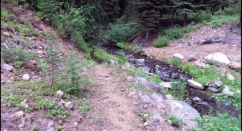 Ford of Sand Pass Creek in early August.