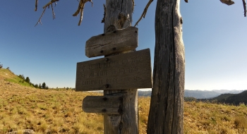 Trail sign that ends this unofficial trail. 